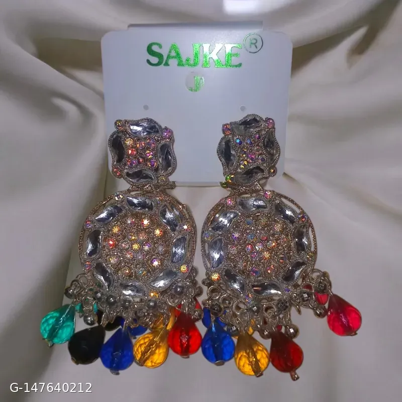 These gold-plated chandbali drop earrings by SAJKE feature intricate metallic details, rhinestone embellishments, and vibrant, multicolored