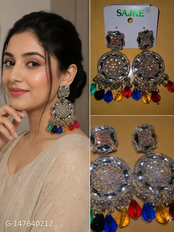 These gold-plated chandbali drop earrings by SAJKE feature intricate metallic details, rhinestone embellishments, and vibrant, multicolored