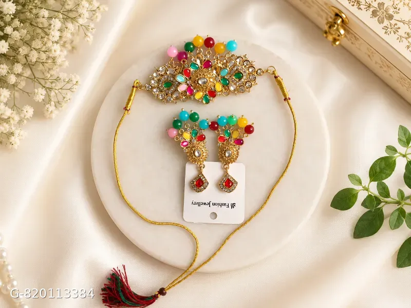 This gold-plated Kundan choker set features multicolored beads and artificial stones, resembling traditional Indian bridal jewelry