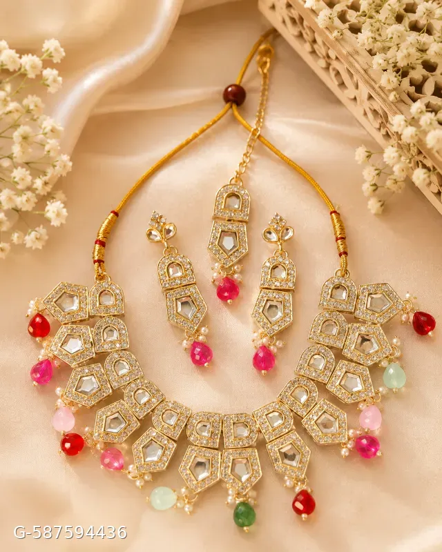 This Karatcart gold-plated Polki Kundan choker set features geometric stone settings accented with multi-colored enamel beads.