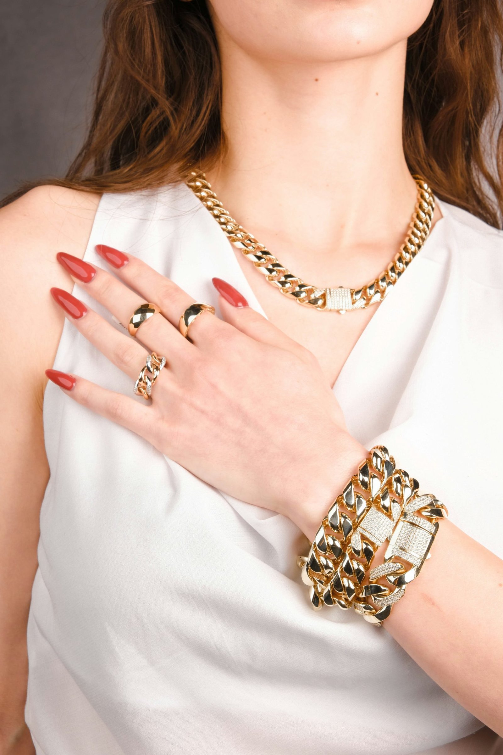 a woman wearing gold jewelry